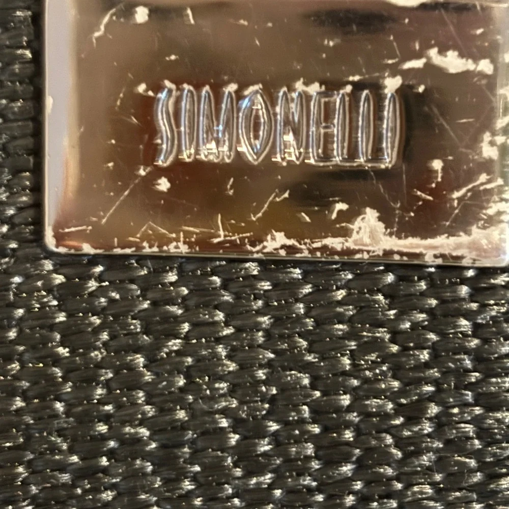 SIMONELLI BRAND BLACK HAND BAG WITH BAMBOO LIKE(ACRYLIC) HANDLES SNAP CLOSURE